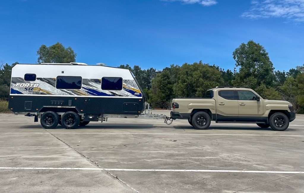 Kia Tasman and an MDC Forte SR19 tandem-axle caravan getting ready for a lap of Australia